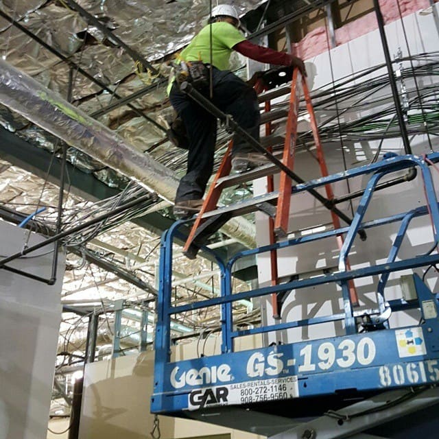 Contractors working unsafely on ladders